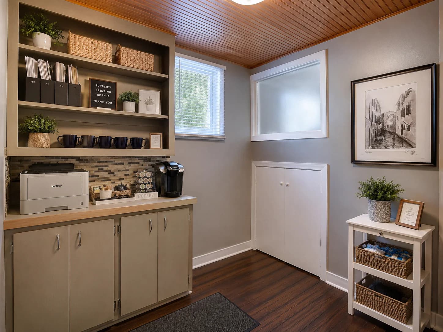 Conceptual shared support nook with printer, coffee station, cabinets, and supplies