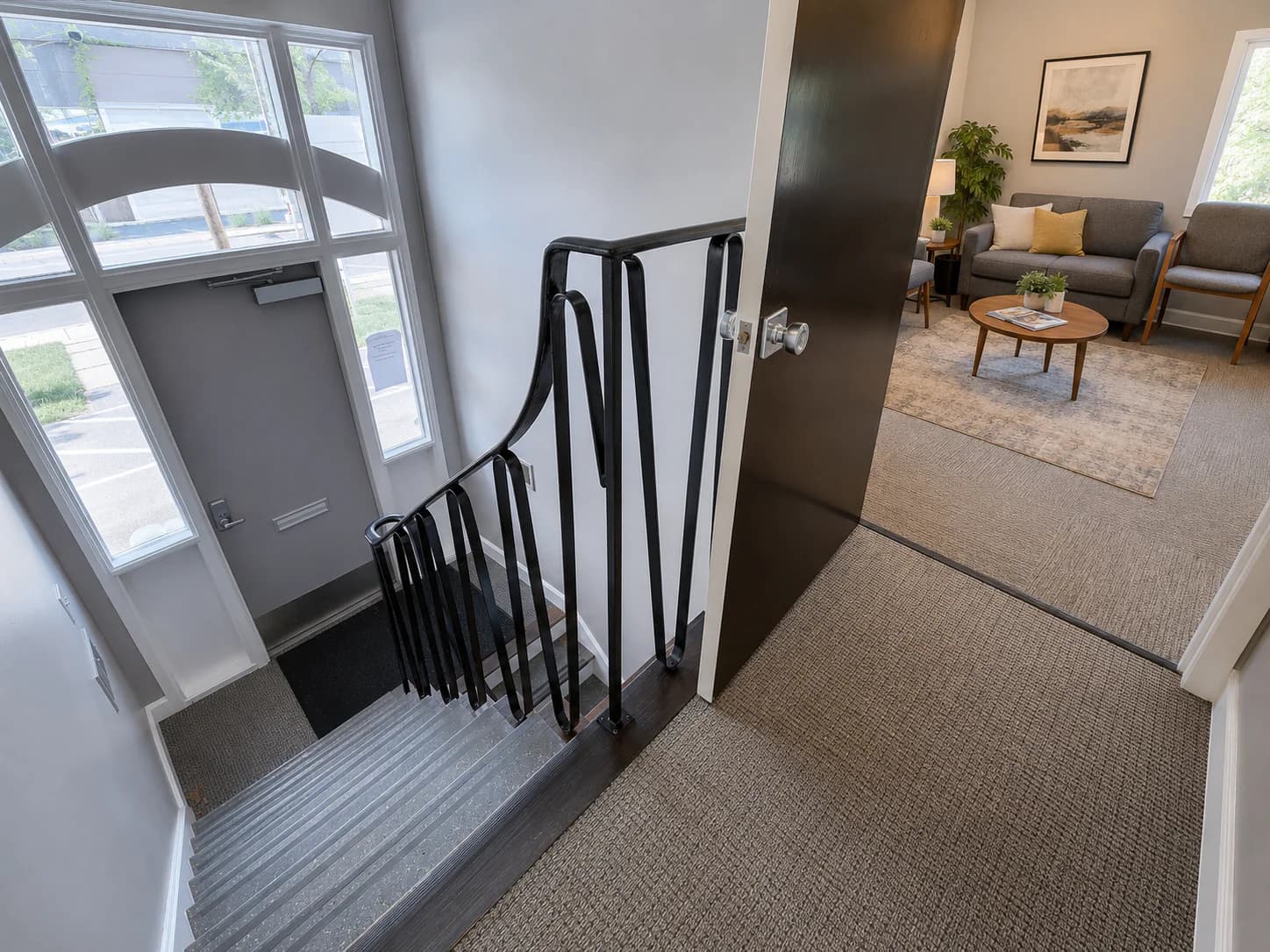 Conceptual shared waiting area viewed from the stair landing