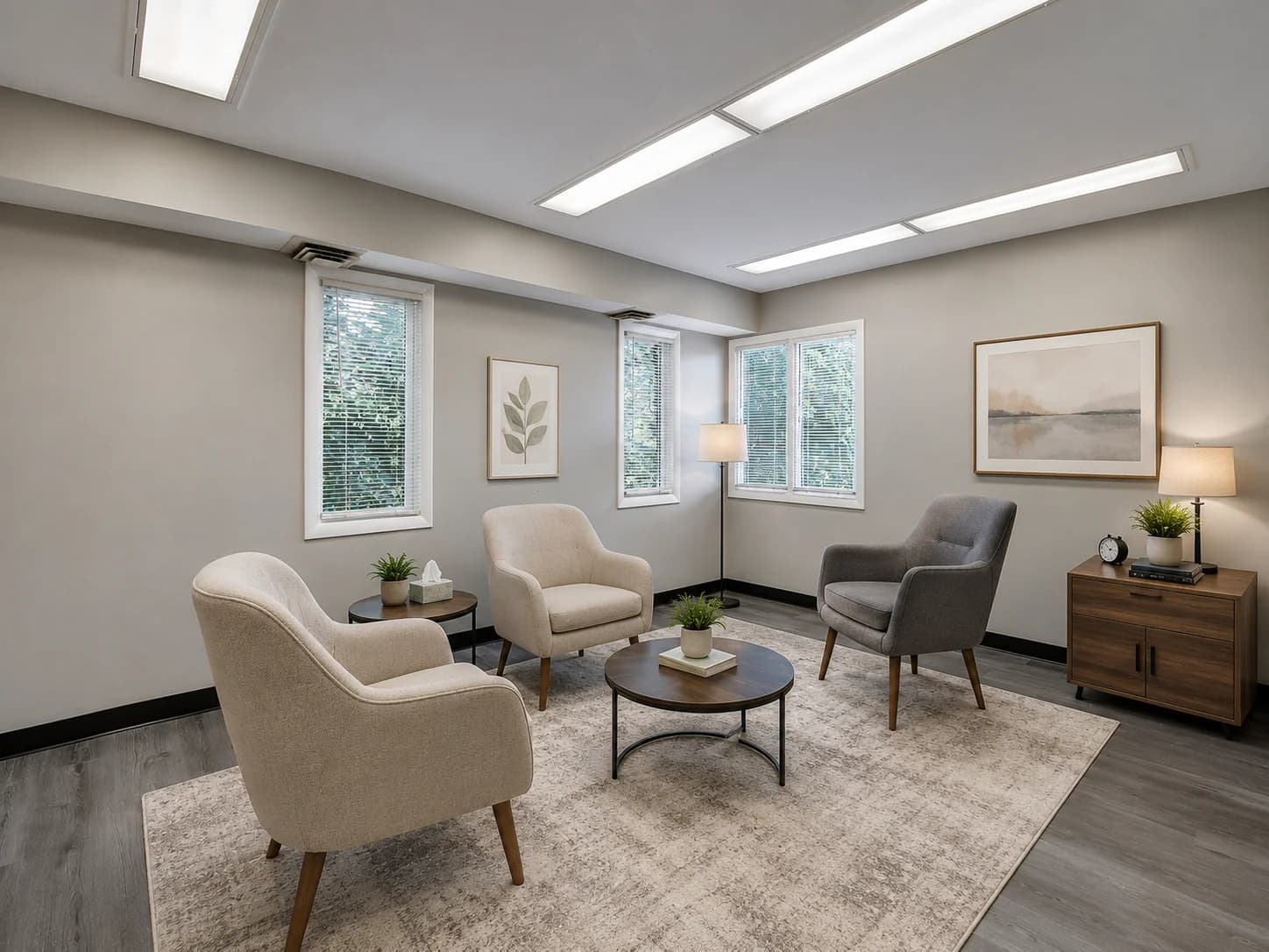 Conceptual rendering of a therapy and counseling office with four chairs arranged for conversation